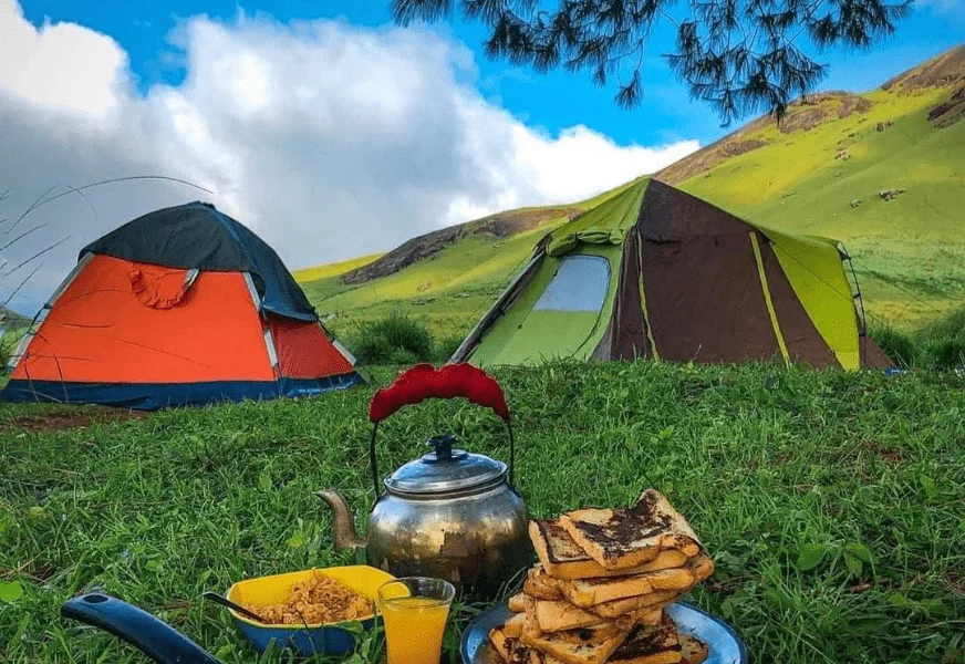 Sri Lanka camping campaign tents, mountain view, outdoor breakfast, nature travel.